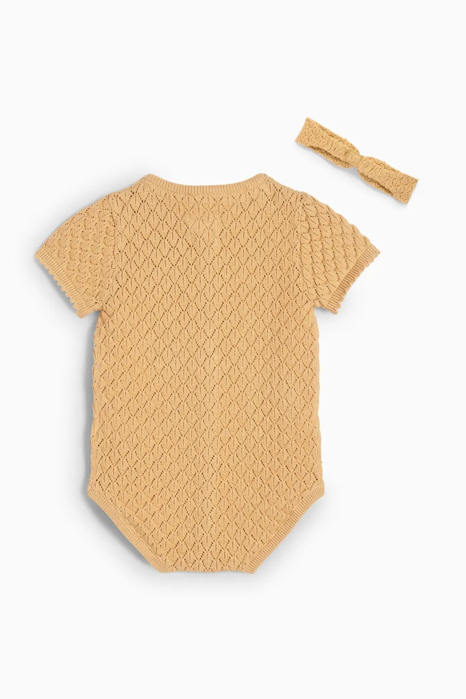Structured knit romper with openwork pattern
