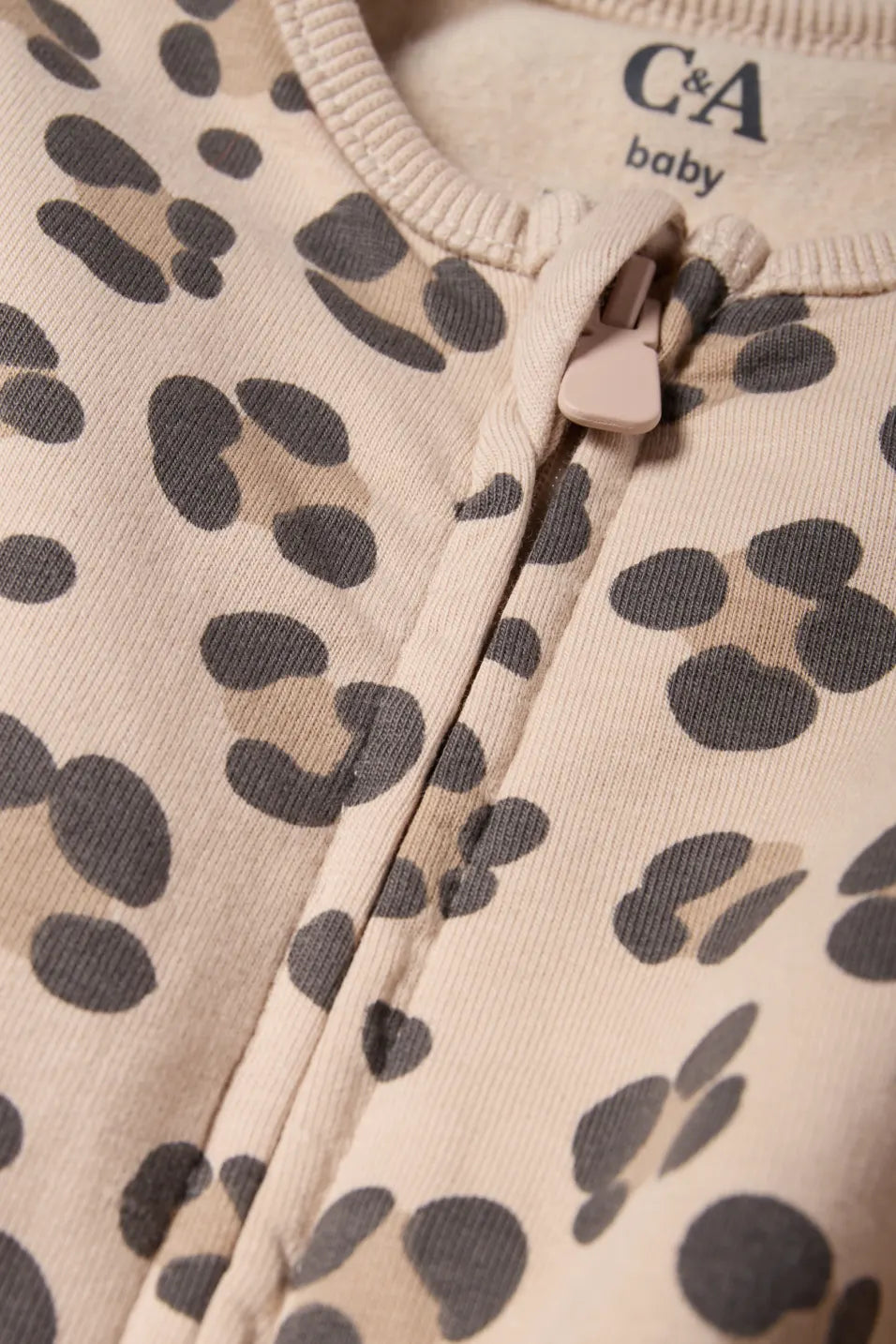 Leopard - lined sleepsuit