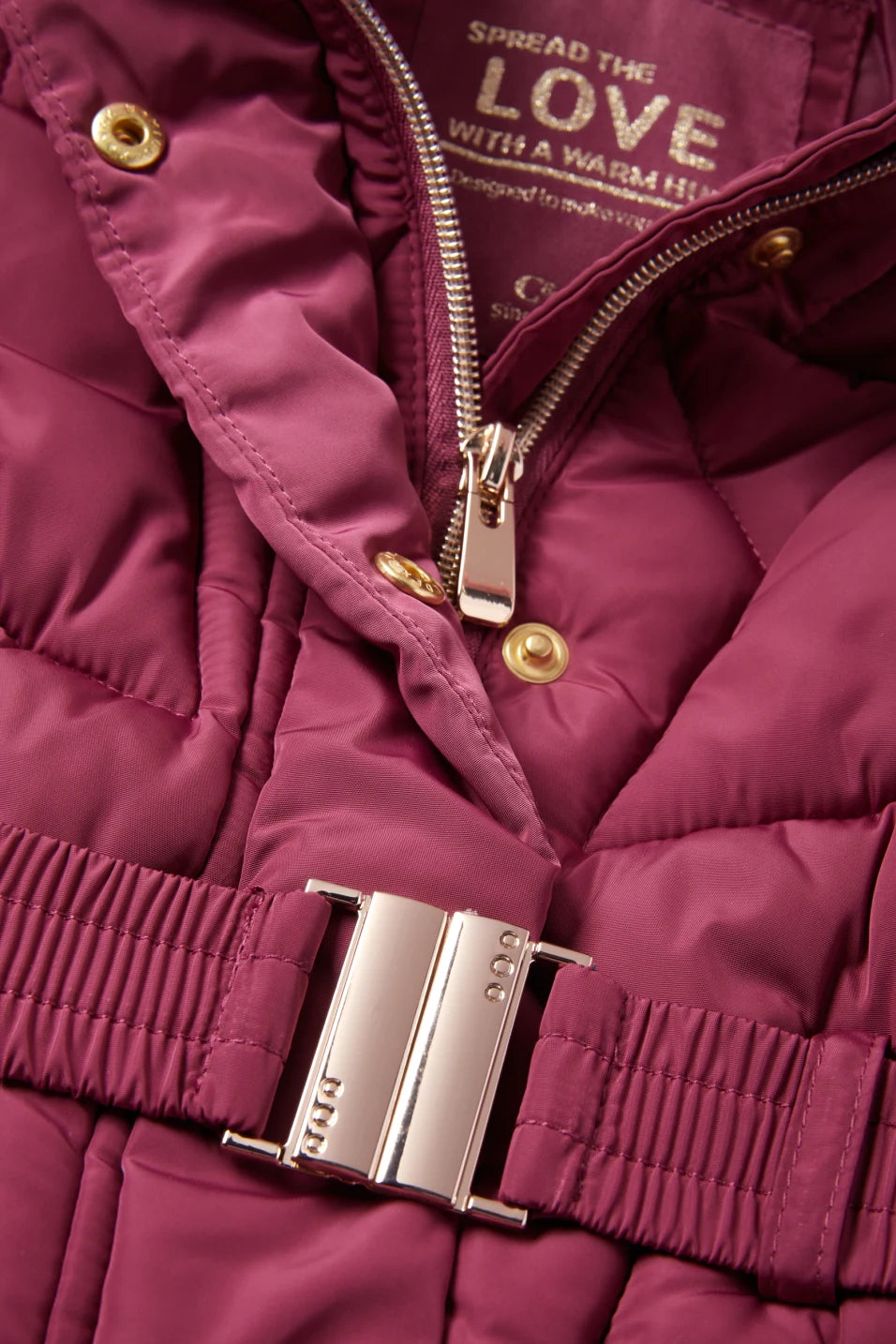 Quilted jacket with hood and faux fur trim