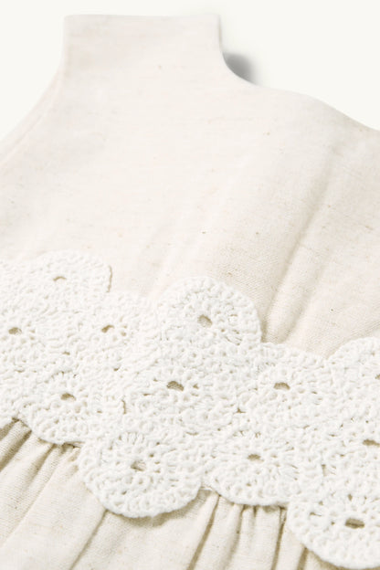 Crocheted linen baby jumpsuit